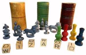 Component sets will include one of three varieties of shaking-cup and either one of two distinct sets of pewter pieces or one set of wooden pawns. Every set has identical WIZARD cubes.