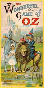 Box art for the game depicting Dorothy, the Tin Woodman, the Scarecrow, and the Lion in front of a castle.